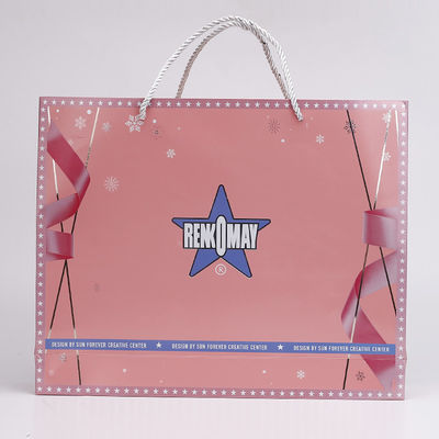 Adaptez le sac aux besoins du client de papier de l'emballage cadeau 300gsm emballage d'habillement polychrome
