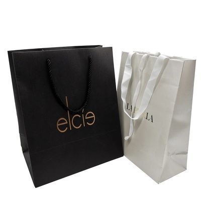 Adaptez le sac aux besoins du client de papier de l'emballage cadeau 300gsm emballage d'habillement polychrome