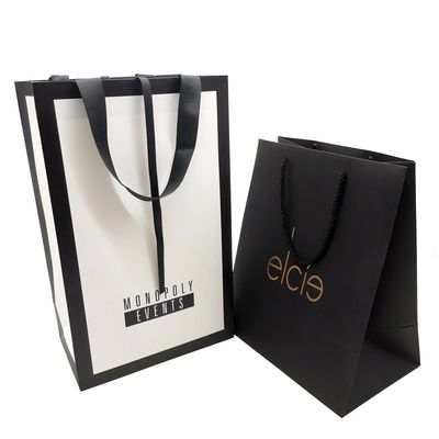 Adaptez le sac aux besoins du client de papier de l'emballage cadeau 300gsm emballage d'habillement polychrome